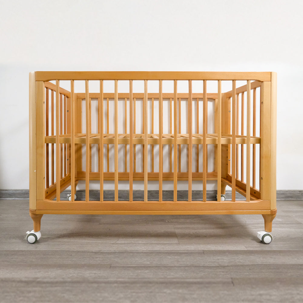 "8-in-1 Convertible Baby Crib: Desk, Playpen, Bassinet & More!"