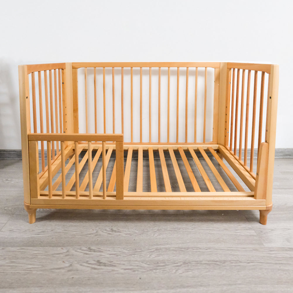 "8-in-1 Convertible Baby Crib: Desk, Playpen, Bassinet & More!"